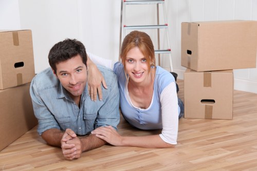 Local moving van helping with furniture transport in West Ham