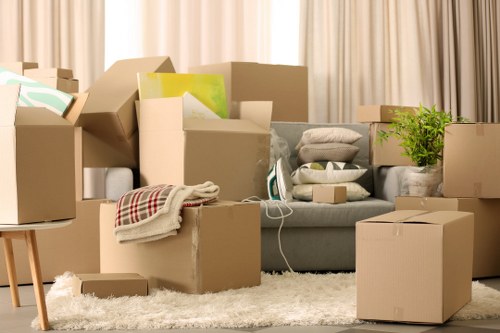 Local van moving furniture near West Ham residential streets