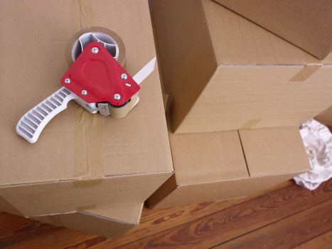 Commercial moving team handling office furniture in East London