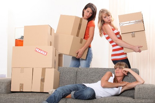 Removal team handling a flat move in West Ham with careful loading