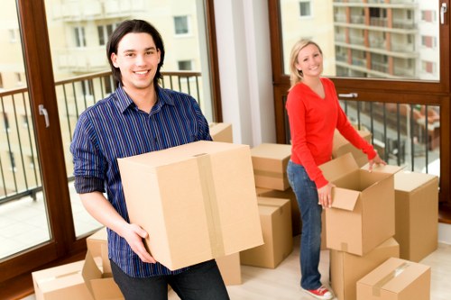 Packing boxes and household items ready for removal services in West Ham